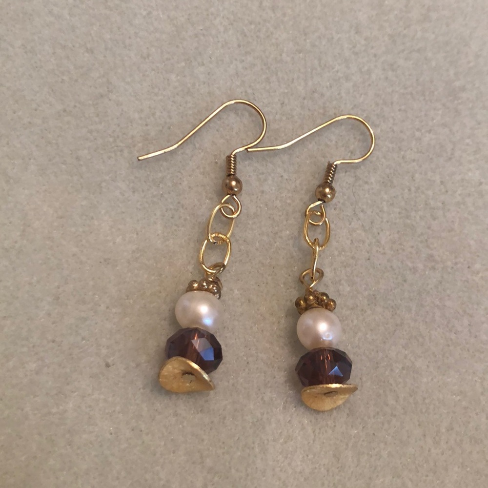 Cute gold pearl earrings with a purple glass bead